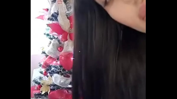 Gorgeous Latina in a red bow