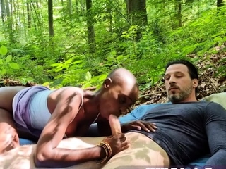 cute African woman having interracial sex outside